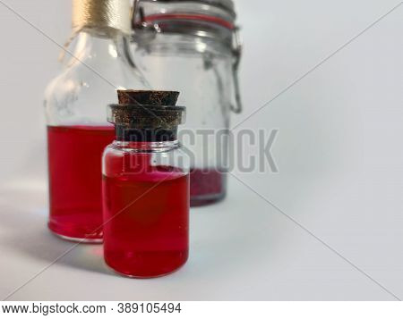 Potions With Red Liquid. Alchemy Set With Flasks. Small Glass Bottles With Colored Liquid For Game R