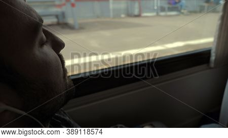 Long Way. Man Sleeping In The Train. People Standing Behind The Window.