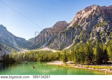 Lake Braies,italy - September 9,2020 - People On A Walk Along The Shore Of The Lake Braies. Lake Bra