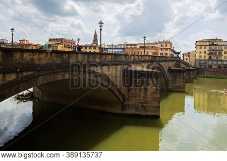 Flornce, Italy - April 24, 2019: View Of The Historic Buildings In Florence. Reflection In The River