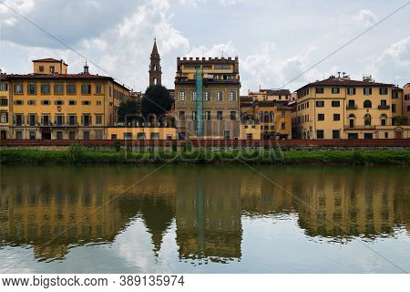 Flornce, Italy - April 24, 2019: View Of The Historic Buildings In Florence. Reflection In The River