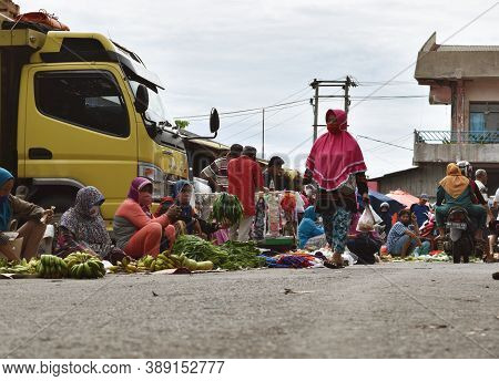 Bengkulu, Indonesia - October 11, 2020: People Selling Food And Vegetables In Traditional Markets In