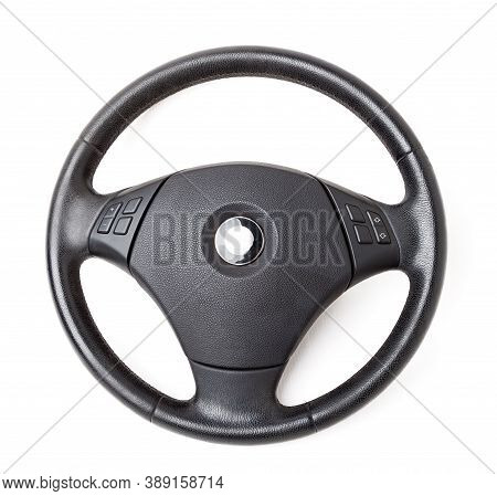 Spare Part And Interior Element Of A Car Steering Wheel With Leather Trim And Buttons With Airbag On