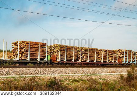 Kouvola, Finland - 24 September 2020: Railway Carriages With Timber At Paper Mill Stora Enso