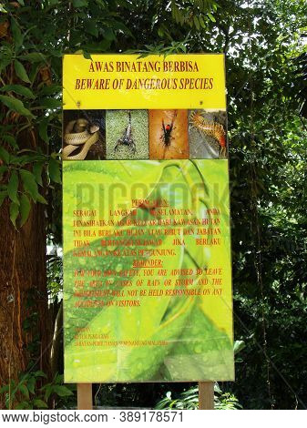 Kuala Lumpur, Malaysia, February 1, 2016: Sign Announcing Dangerous Animal Species In Kl Forest Eco 