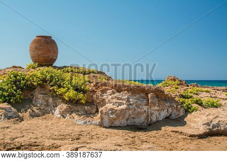Sea Coast And Beach With Rocks, Rocky Coastline, Blue Sea,greek Vase