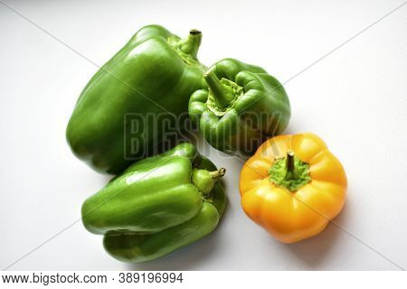 Yellow Green Regular Pepper On A White Background