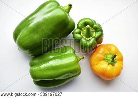 Yellow Green Regular Pepper On A White Background