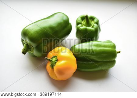 Yellow Green Regular Pepper On A White Background