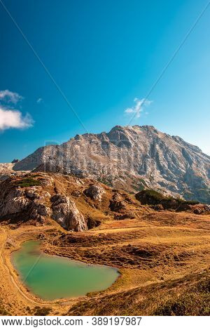 The Bordaglia Lake In A Colorful Autumn Day
