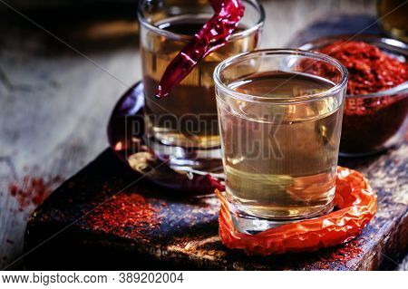 Traditional Ukrainian Vodka With Pepper Gorilka, Dark Vintage Wooden Background, Rustic Style, Selec