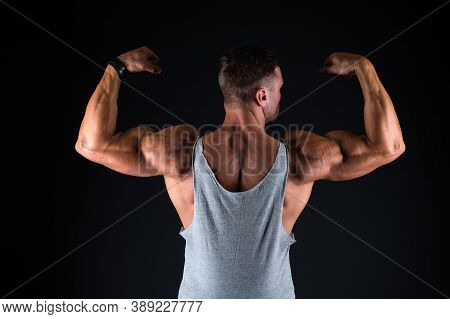 Lets Get That Body Trained. Fit Guy Flex Arms Showing Biceps Triceps. Muscle Power. Power And Streng
