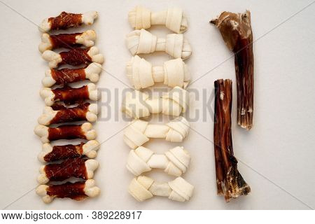 Variety Of Dog Treats. Dod Delicacy Food On White Background.