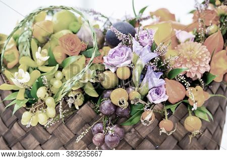 Beautiful Decoration Floral Composition Or Bouquet Of Seasonal Fruits Grapes Dogrose Rosehip And Phy