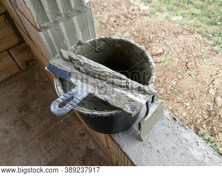 Taping Knifes And Cement Bucket(construction Work Tools) For Constructions At Construction Site