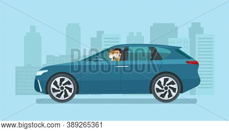 Modern Electric Cuv Car With A Young Man And Woman In A Medical Mask Driving On A Background Of Abst