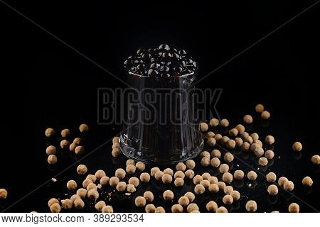 Boiled Tapioca Pearls On Black Background. For Bubble Tea Concepts Tapioca Balls - A New Trend In Fo