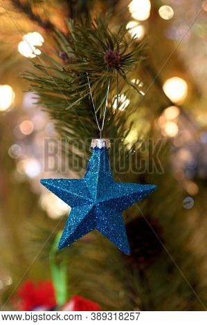 The blue toy star for christmas tree decoration looks awesome