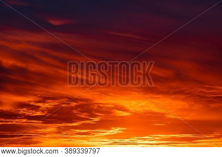 Beautiful Cloudscape With Colorful Contrasting Clouds At Sunset