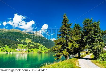 Road At Lake Reschen In South Tyrol, The Italian Alps