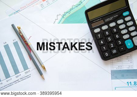 The Word Error Is Written On A White Piece Of Paper With Graphs. Mistakes In Business And Education.