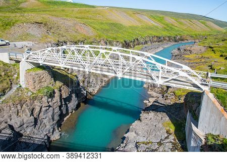Old Bridge In Jokuldalur Valley On The Start Of The Hiking Route To Studlagil Canyon