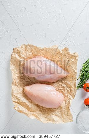 Fresh Raw Organic  Chicken Fillet, Spices And Herbs On White Concrete Background, Top View