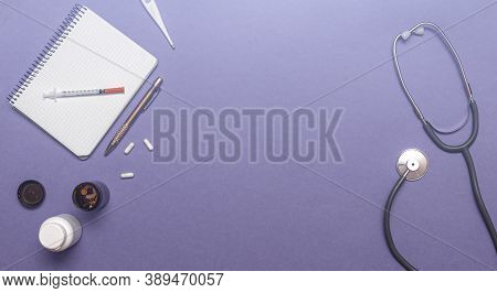 Medical Equipment Stethoscope, Syringe, Thermometer And Notebook On Pastel Violet Color, Healthcare 