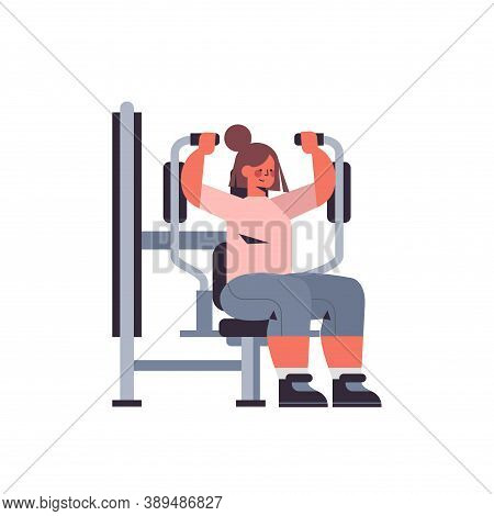 Sportswoman Exercising On Training Apparat Girl Doing Physical Exercises Working Out In Gym Healthy 