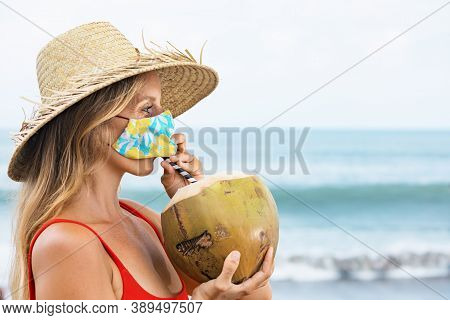 Funny Portrait Of Woman In Straw Hat Drinking Young Coconut On Tropical Sea Beach. New Rules To Wear