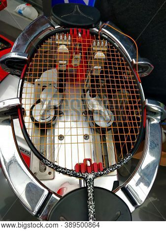 Top View Of Stringing Badminton Racket On The Racquet Weaving Machine