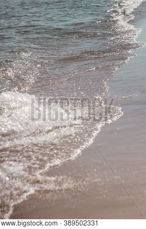 Water Surface Background Sea Waves At The Sunset. Vintage Photos Wits Stretches And Dust