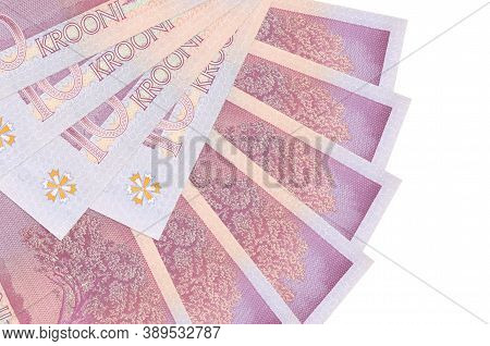 10 Estonian Kroon Bills Lies Isolated On White Background With Copy Space Stacked In Fan Shape Close
