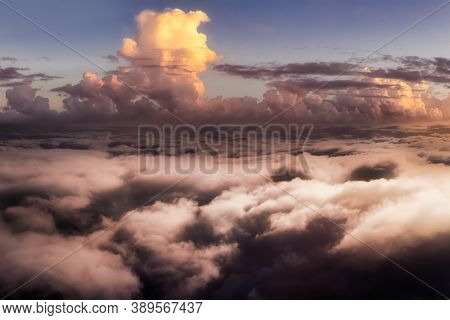 Dramatic Aerial Panoramic View Of Cloudscape During A Colorful Sunset Or Sunrise. Artistic Render. H
