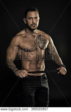 He Got Perfect Torso. Muscular Man Hold Leather Belt. Fetish. Bdsm Love Game. Sportsman Bare Chest A