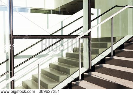 Large Staircase Outside And Inside That Runs Parallel