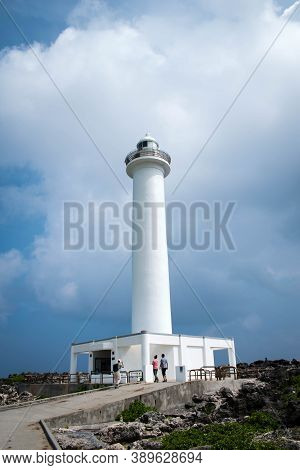 Cape Zanpa Lighthouse With Blue Sky Bright Clouds