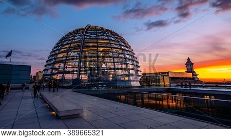 Berlin, Germany - 19 September 2020: Glass dome of Reichstag at sunset