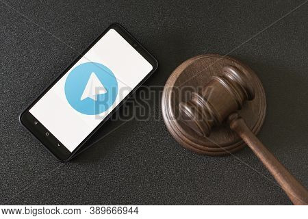Kharkov, Ukraine - June 25, 2020: Telegram App On Smart Phone Screen And Mallet Of The Judge. Telegr
