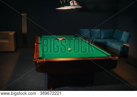 Billiard Table With Green Surface And Balls In The Billiard Club.pool Game