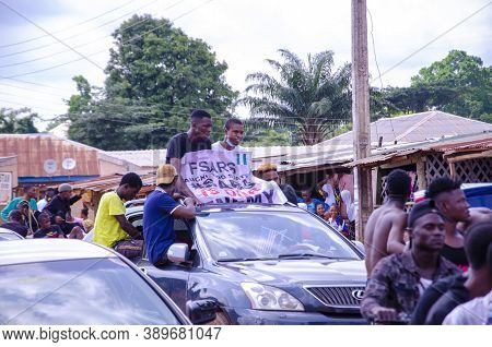 Lagos, Nigeria - October 12, 2020: Group Of Nigerian Youths Protesting Around The City About End Sar