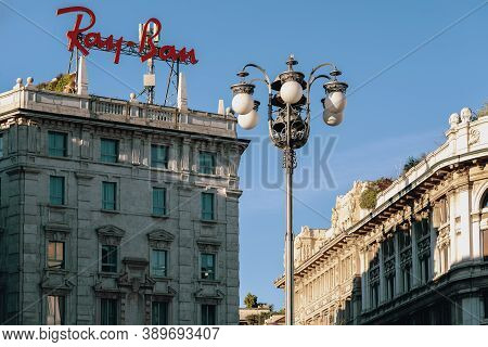 Ray-ban Brand Logo Sign On The Top Of Building In The Center Of The City. Ray-ban Is An American-fou