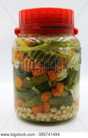 Turkish Tursu Pickled Vegetables In Jar Isolated On White Background.