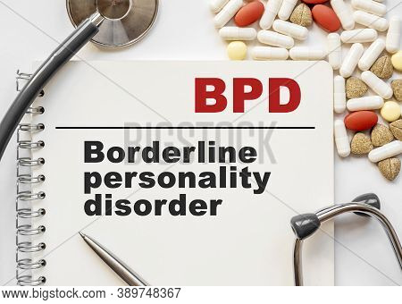 Page In Notebook With Bpd Borderline Personality Disorder On White Background With Stethoscope And G