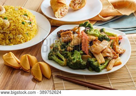 Buddha's Delight Sauteed Mixed Chinese Vegetables With Tofu Served With Chicken Fried Rice And An Eg