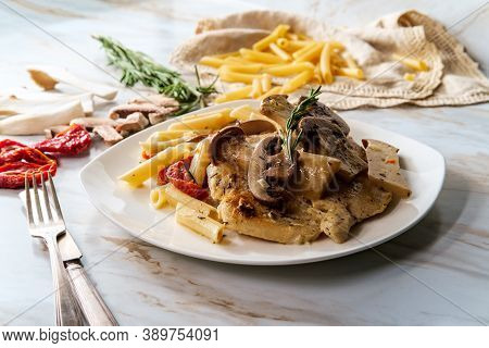 Creamy Italian Chicken Marsala With King Oyster Mushrooms And Sundried Tomatoes Served Over Penne Ri
