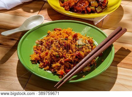 Takeout Chinese Kung Pao Chicken And Shrimp With Peanuts And Side Of Pork Fried Rice