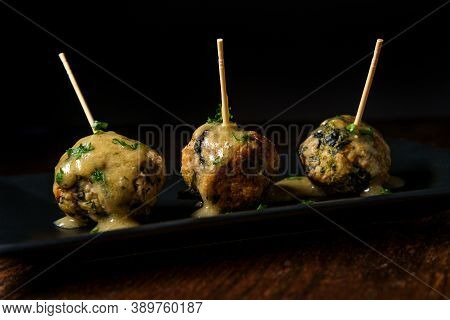 Delicious Swedish Meatballs With Sauce On Rustic Wooden Table