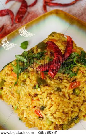 Mexican Style Spicy Spanish Rice With Beef Carrots Green Peas Bell Pepper And Hot Chili