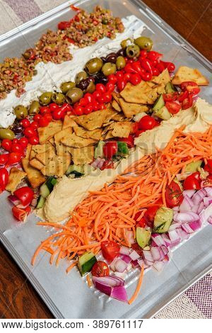 Greek Olive Hummus Platter With Sweety Drop Miniature Peppers And Pita Chips